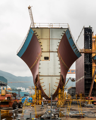 Illustration for article titled Pictures of the World's Biggest Cargo Ship Make You Feel Tiny